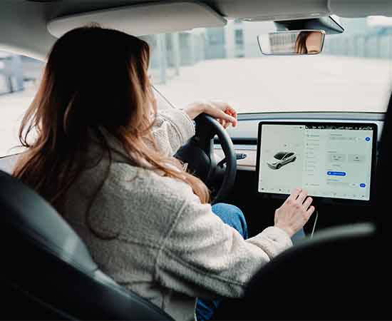 Girl driving our driving school car for test