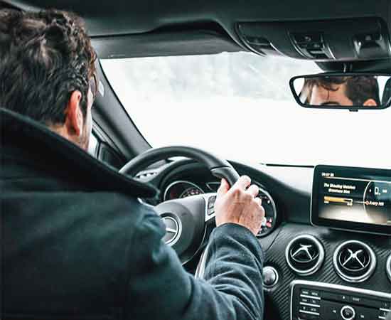 Man driving our driving school windsor car for test